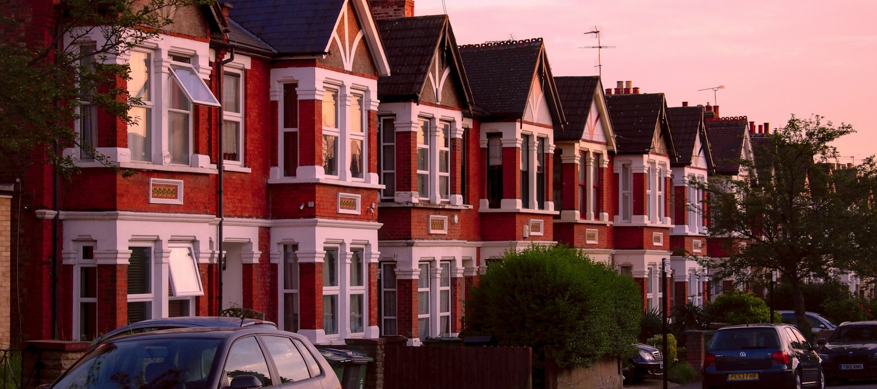 Rows of London terraced houses at dusk